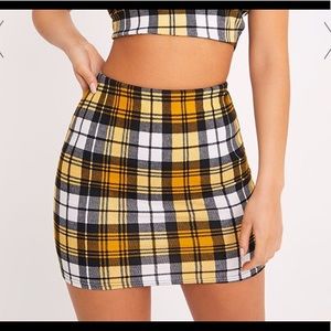 Never worn Pretty little thing plaid skirt